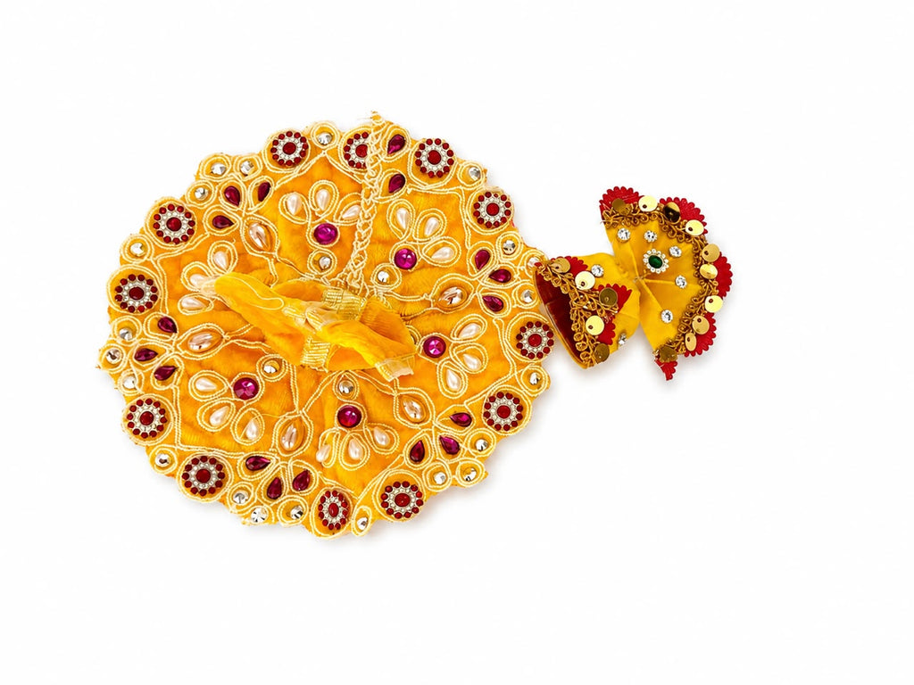 Radiant yellow Laddu Gopal poshak adorned with regal embellishments, sparkling stones, and exquisite craftsmanship.