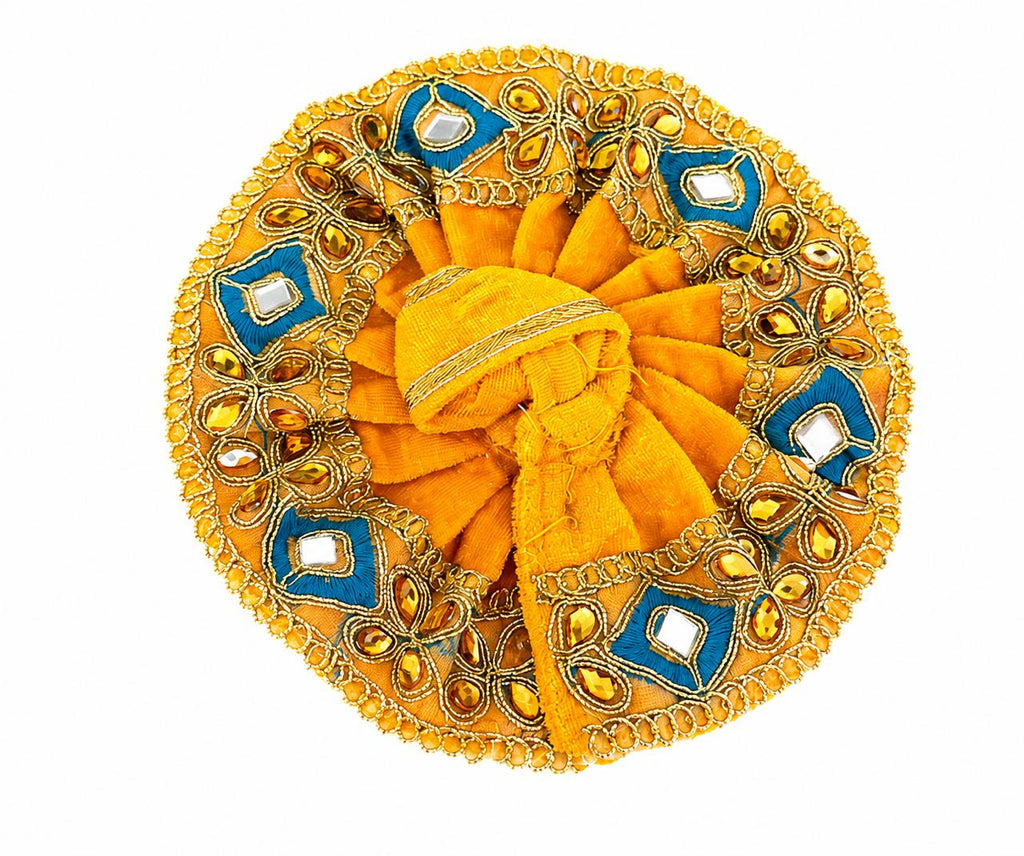 Regal Orange Laddu Gopal Poshak adorned with intricate Zari, mirrorwork, and exquisite embellishments.