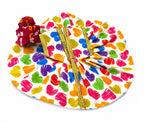 White Laddu Gopal poshak with vibrant heart prints, golden lace, and matching maroon pagdi.