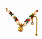 Divine Laddu Gopal Shringar Set with Peacock Feather, Multicolor Beads, Pearls, Jewels, and Golden Accents.