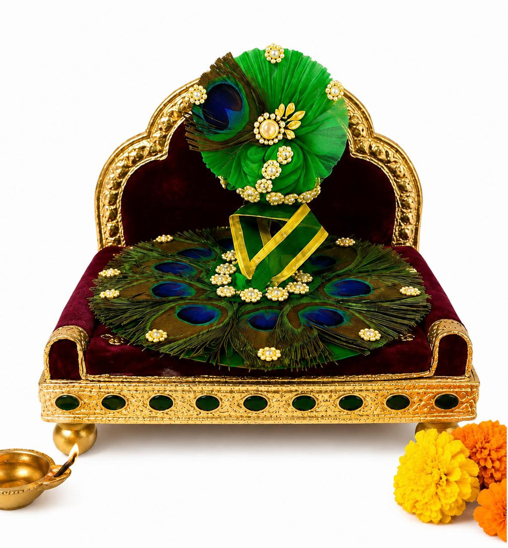 Premium green Kanha poshak decorated with natural peacock feathers and sparkling crystal embellishments.