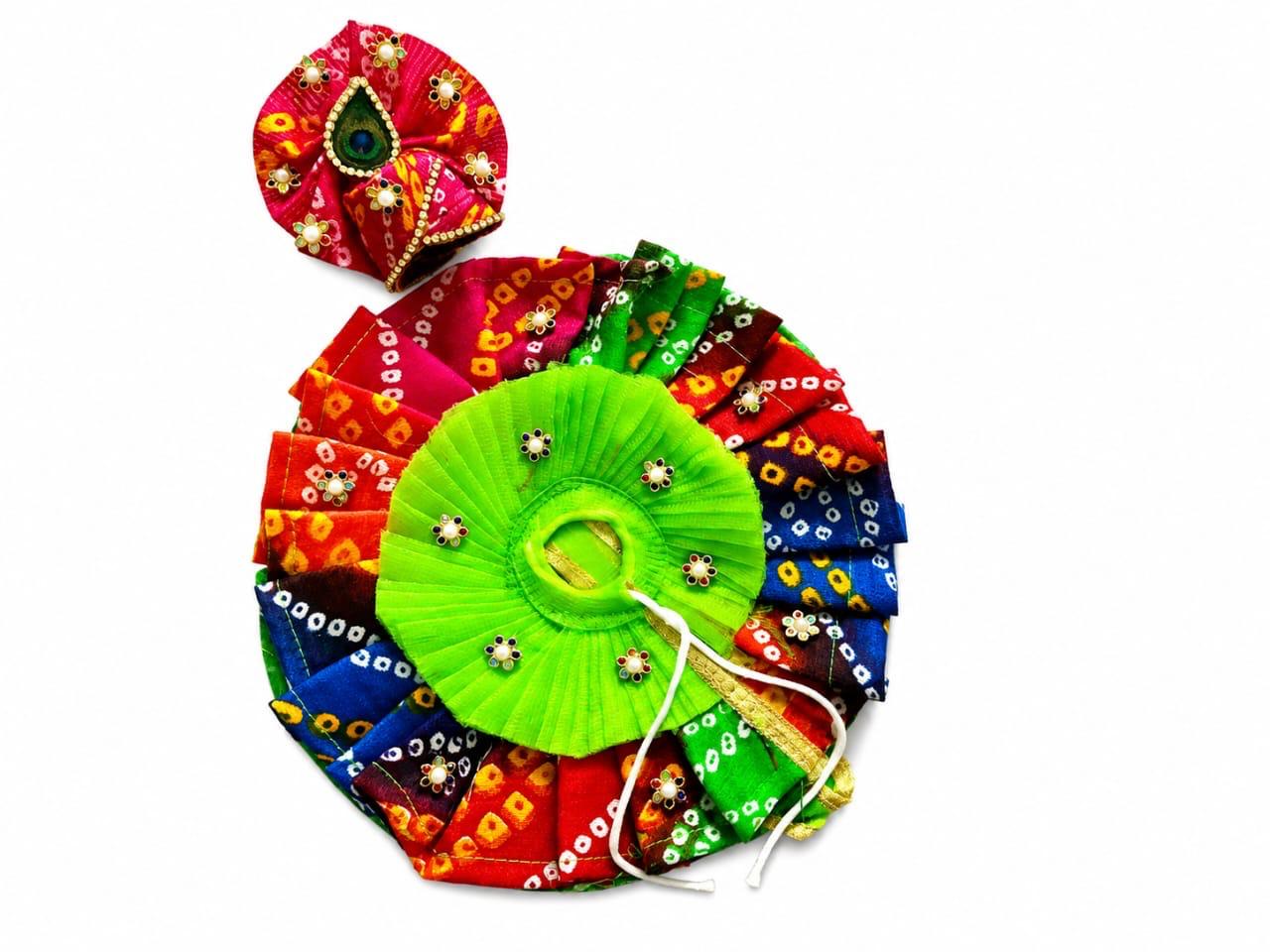 Colorful Bandhani Laddu Gopal poshak with bright green blouse and peacock feather mukut.
