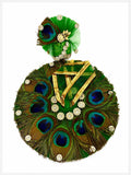 Premium green Kanha poshak decorated with natural peacock feathers and sparkling crystal embellishments.